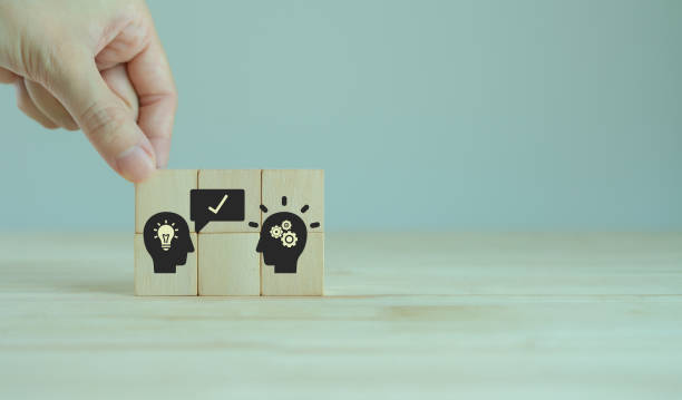 istock Suggestion and consulting concept.  New idea, solution. Putting wooden cubes with recommend to advise someone icon on grey background. Business review, strategy suggestion for business developement. 1391695749