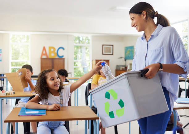 istock Shot of a leaner and teaching recycling in a classroom 1391720648