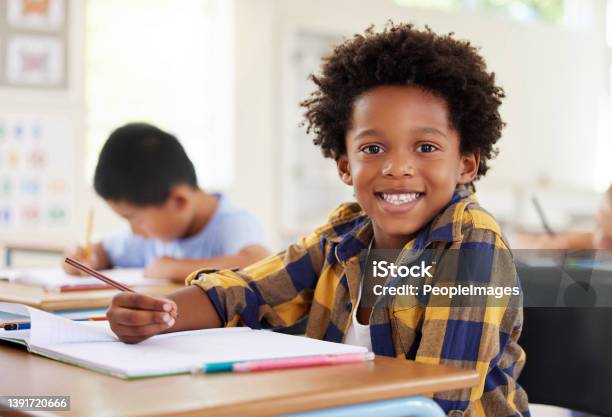 Shot Of A Preschooler Colouring In Class Stock Photo - Download Image Now - Education, Child, School Building