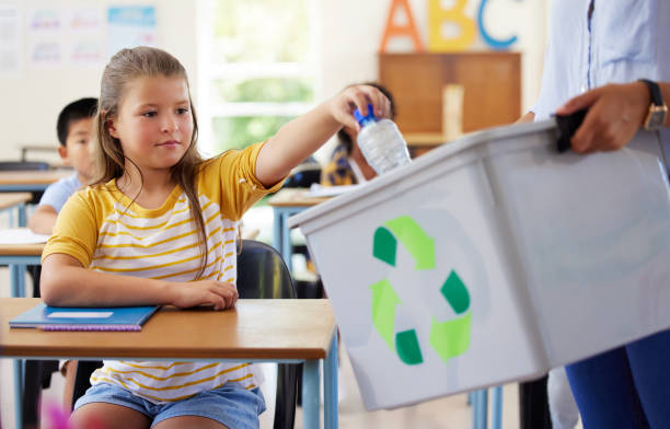 istock Shot of a leaner and teaching recycling in a classroom 1391720721