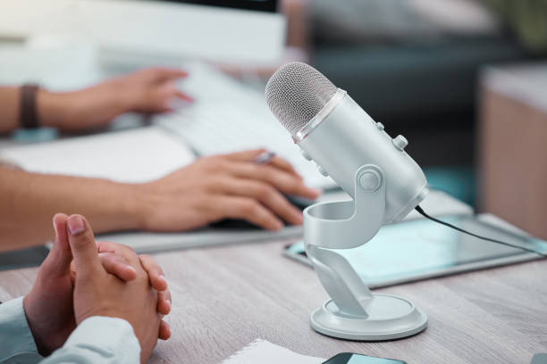 istock Closeup shot of two unrecognisable men doing a broadcast in an office 1391721625