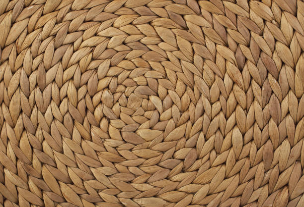 istock Dry banana leaf artwork background with circle structure. Wicker placemat background. Round traditional handmade rattan pattern. 1391721912