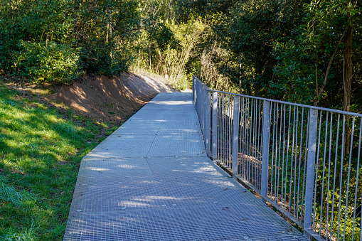 metal walkway in the park protective steel fence