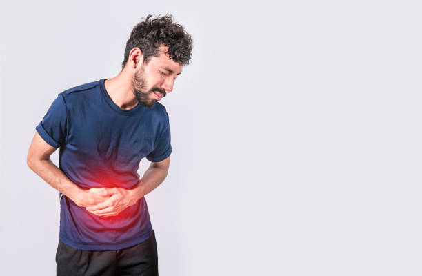 istock person with stomach pain, stomach problems concept, man with digestive problems, man with stomach pain, isolated 1391727946