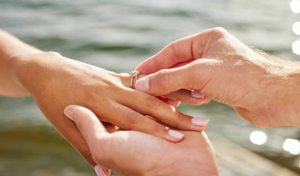 istock Shot of an unrecognizable couple getting engaged 1391730266