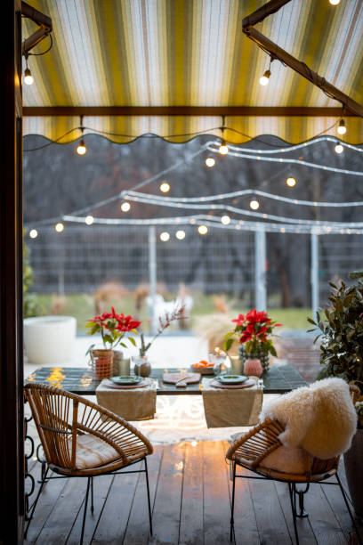 istock Cozy backyard with decorated and served table for a dinner 1391730476