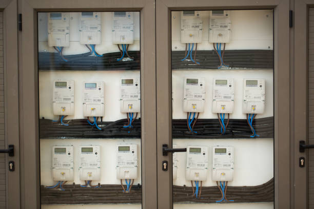 Electric circuit breaker box of home electrical system with new modern electronic electrical meter.