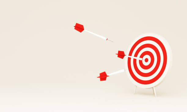 istock Dart hitting a target on the center on white background with copy space. Minimal concept. 3d render illustration 1391735321