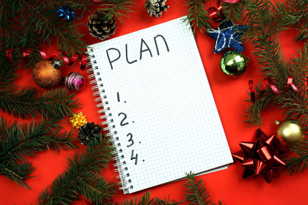 istock Christmas background with notepad. plans for the year. 1391735784