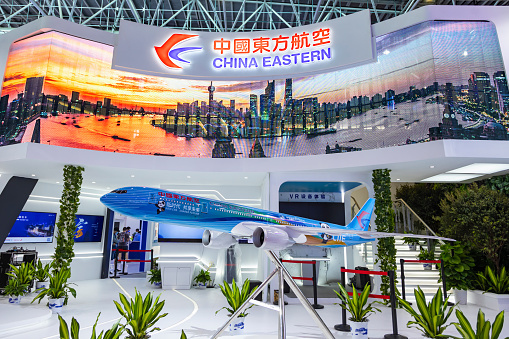 A Boeing 777 aircraft model on display at the China Eastern Airlines stand at Zhuhai Air show.
China Eastern Airlines Corporation Limited (simplified Chinese: 中国东方航空公司; traditional Chinese: 中國東方航空公司), also known as China Eastern, is an airline headquartered on the grounds of Shanghai Hongqiao International Airport in Changning District, Shanghai. Hongqiao airport, along with the larger Shanghai Pudong International Airport, are China Eastern's main hubs, with secondary hubs in Beijing Daxing, Kunming, and Xi'an. China Eastern Airlines is China's second-largest carrier by passenger numbers.
