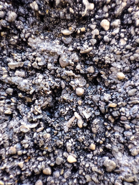 istock Crushed stone wall background - Sumba, April 2022 1391737019