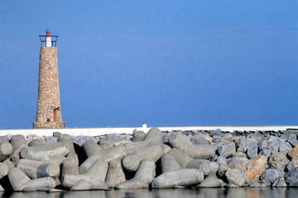 istock the lighthouse on the pier 1391739351
