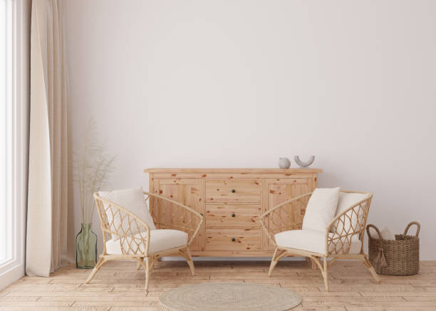 istock Empty white wall in modern living room. Mock up interior in scandinavian, boho style. Free, copy space for your picture, text, or another design. Console, rattan armchairs, pampas grass. 3D rendering. 1391741248