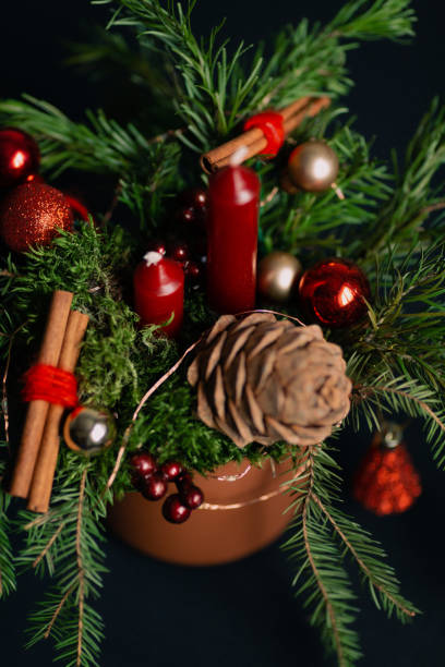 istock beautiful Christmas composition in a mug with a candle 1391743577
