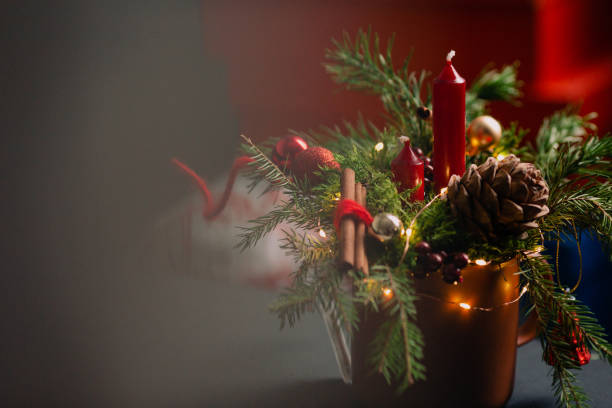 istock beautiful Christmas composition in a mug with a candle 1391743714