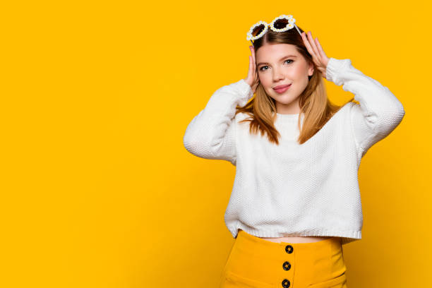 istock Attractive girl in white sweater 1391744937