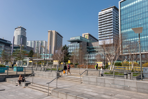 23rd March 2022: Waterfront steps in MediaCityUK beside Manchester Ship Canal in Salford Quays. The area has been developed for media companies, including the BBC and ITV, who have been relocating more production to Manchester, to encourage more north of England involvement.