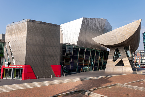 23rd March 2022: The Lowry Theatre and gallery complex at Salford Quays in Greater Manchester. Designed by architect Michael Wilford, the entertainment venue was opened in 2000 by Queen Elizabeth II. The theatre is located close to Media City and is part of the Manchester Ship Canal development of office, residential and leisure buildings along the quayside.