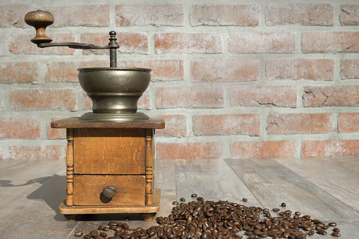 classic style coffee grinder isolated in white background