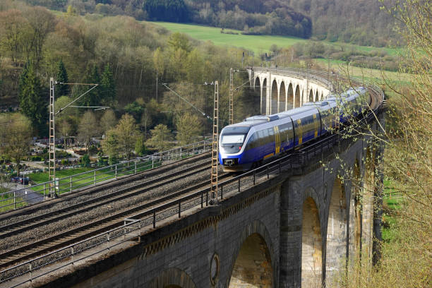 istock A German train speeding over a historical viaduct 1391746527