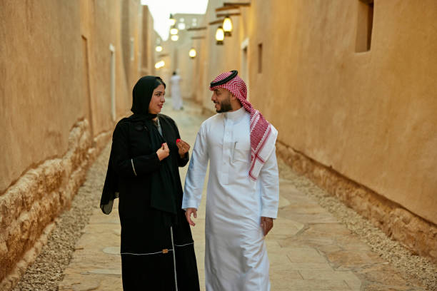 istock Smiling Saudi couple talking while exploring At-Turaif ruins 1391746577