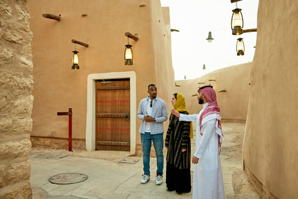 istock Saudi tour guide and visitors exploring ruins near Riyadh 1391746582