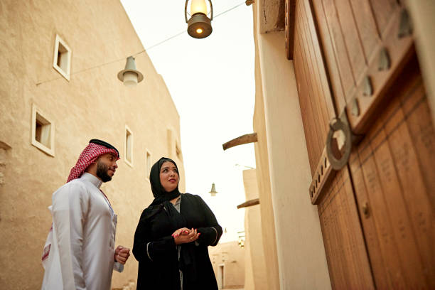 istock Middle Eastern couple visiting Diriyah ruins near Riyadh 1391746592