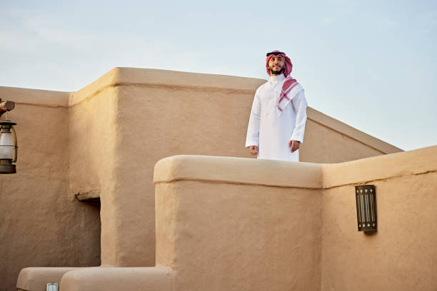 istock Saudi man standing outdoors in Diriyah ruins near Riyadh 1391746611