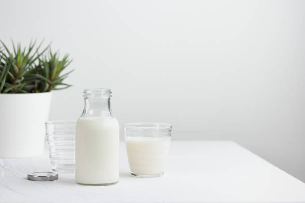 istock Fresh Milk on the table with white tablecloth 1391748160