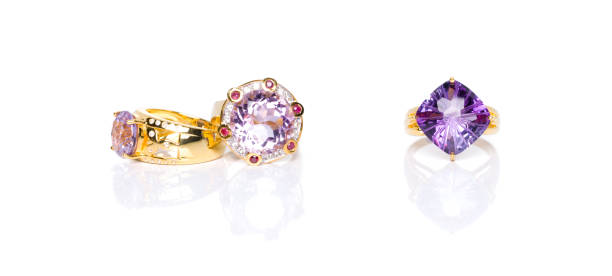 istock Amethyst, ruby and white zircon  Jewel or gems ring on white background with reflection. Collection of natural gemstones accessories. Studio shot 1391749219