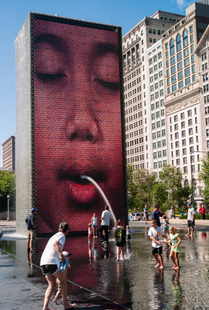 Crown Fountain in Chicago, Illinois Chicago, Illinois, USA - July 25 2009: Crown Fountain designed by  Jaume Plensa in 2004 millennium park chicago stock pictures, royalty-free photos & images