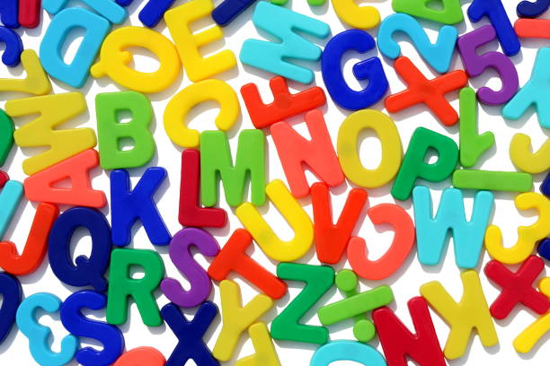 istock The English alphabet bright multi-colored lies on a white background. 1391752888