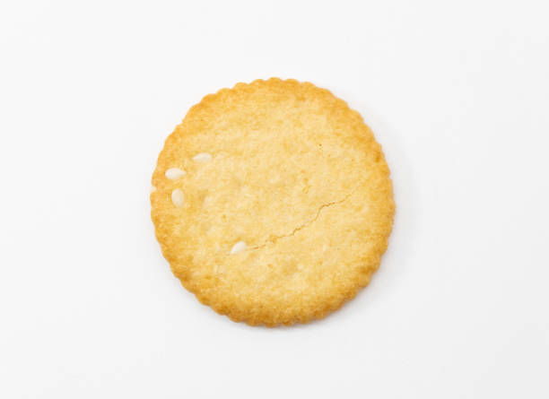 round biscuit isolated on white background, top view stock photo