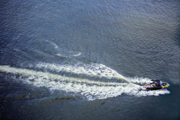 istock The surf boat rides the wind and waves to make waves 1391754400
