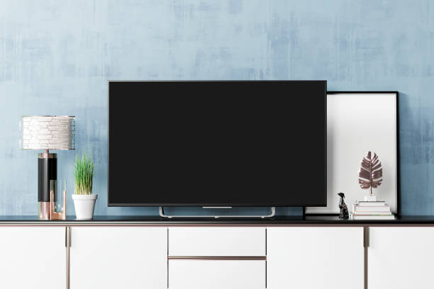 istock TV and poster on pedestal case in modern interior mockup 1391755792