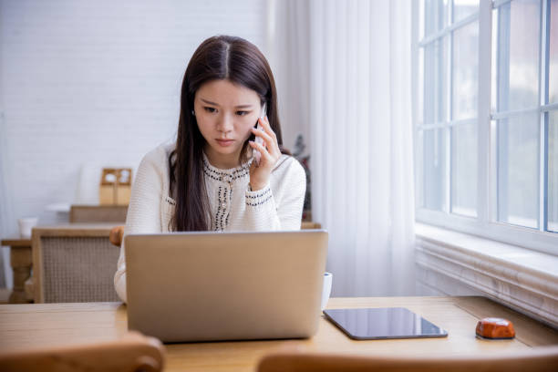 istock Young asian women working 1391759420