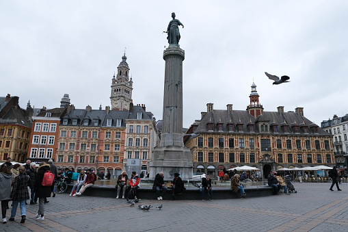People walk in historic center  in Lille, France on February 2, 2022