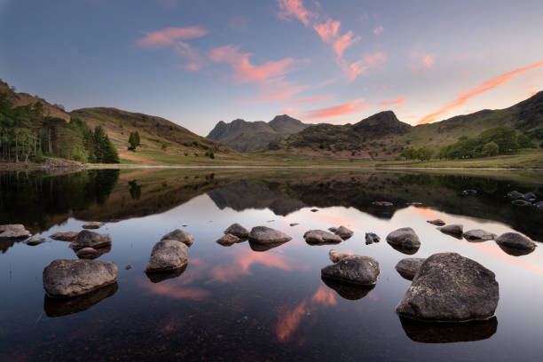 istock Beautiful Sunrise Reflections At Blea Tarn, Lake District, UK. 1391764179