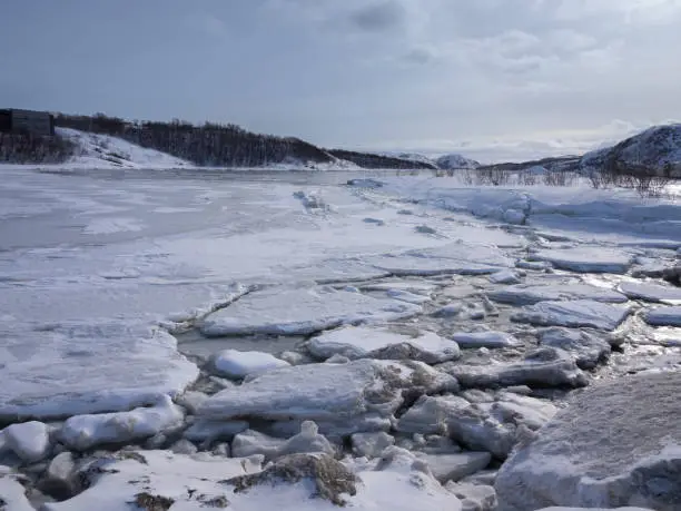 Photo of Wintry lanscapes with frozwn fjords near the town of Kirkenes near the Russian border, Norway