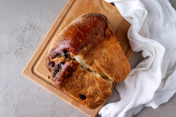 istock wheat flour bread with raisins on a wooden board 1391764398
