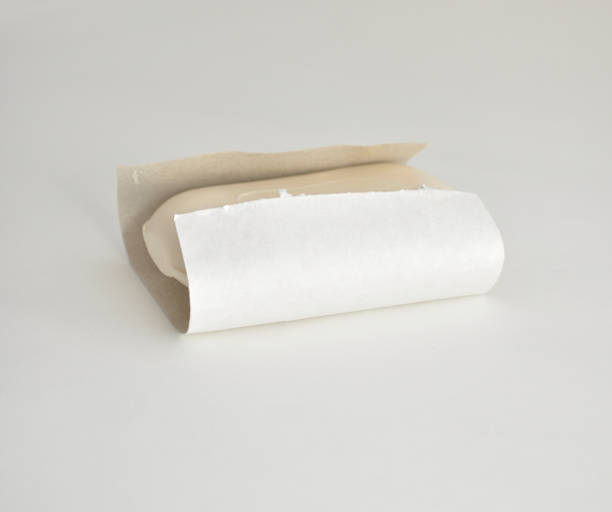 istock soap in craft paper on white background 1391765270