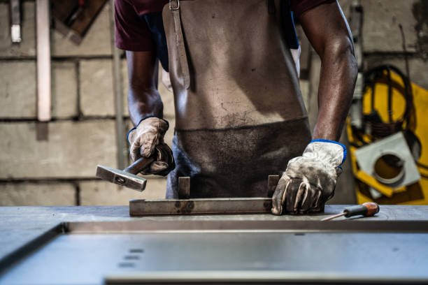 afro american welder - protective glove machinist human hand african descent imagens e fotografias de stock