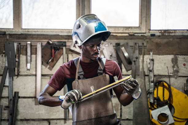 afro american welder - protective glove machinist human hand african descent imagens e fotografias de stock