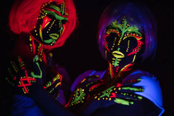 istock Two Young Women With Fluorescent Makeup 1391770563
