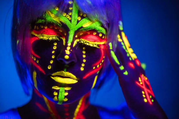 istock Young Woman With Fluorescent Makeup 1391771102