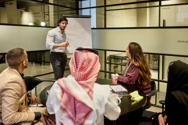 istock Project manager discussing ideas with teammates 1391771138