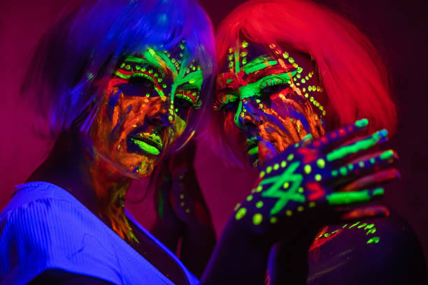 istock Two Young Women With Fluorescent Makeup 1391771162
