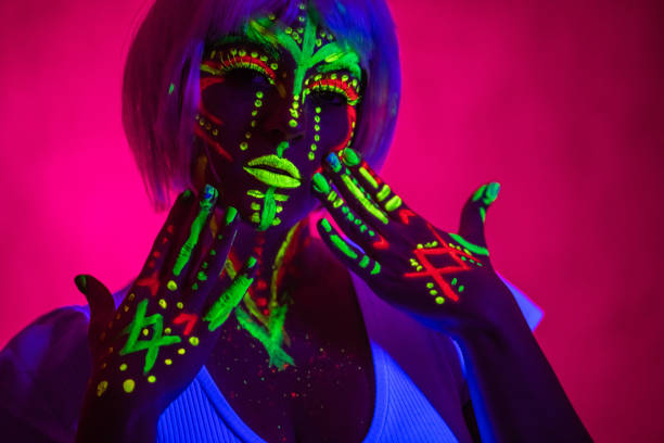 istock Young Woman With Fluorescent Makeup 1391771270
