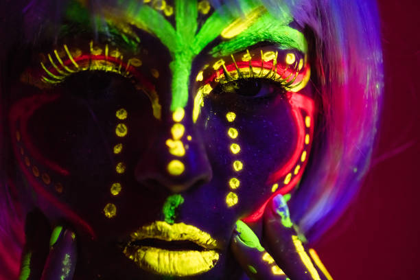 istock Young Woman With Fluorescent Makeup 1391771296