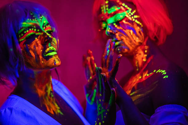 istock Two Young Women With Fluorescent Makeup 1391771464